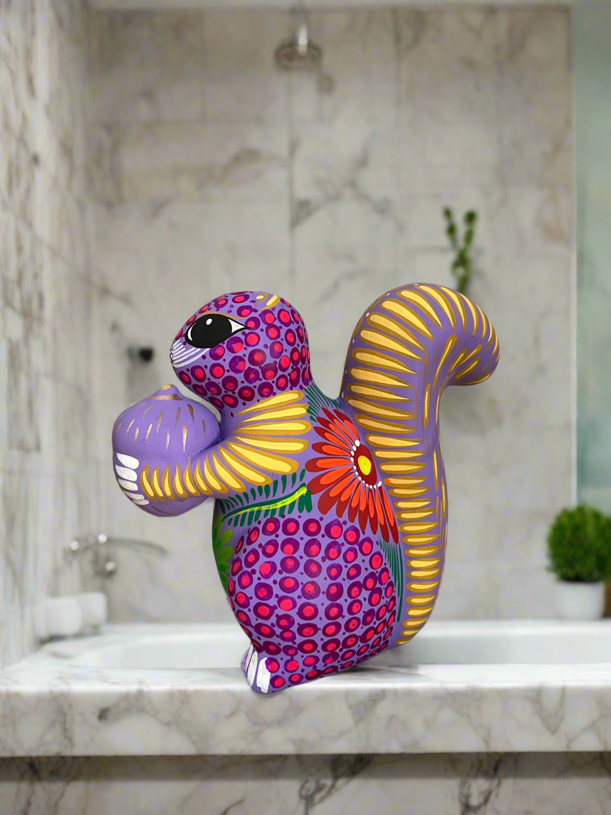 Lavender Squirrel Holding a Nut Figurine