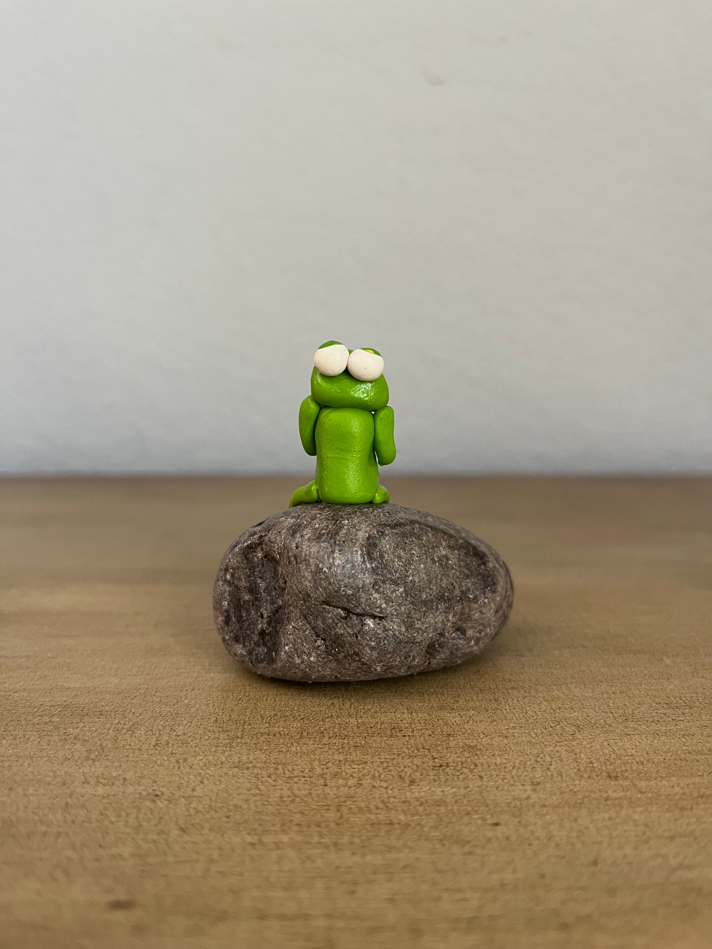 Frog on a Rock Eating a Chocolate Donut Figurine