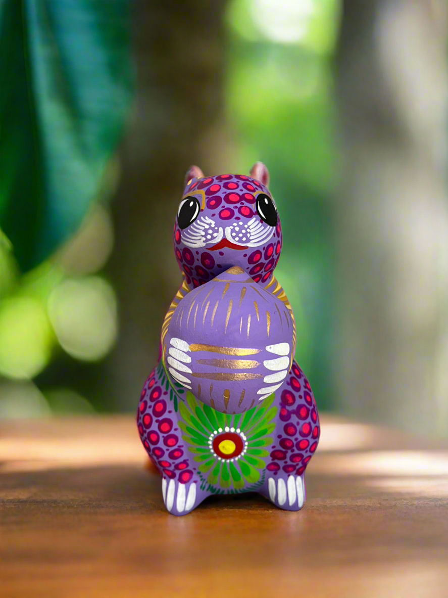 Lavender Squirrel Holding a Nut Figurine