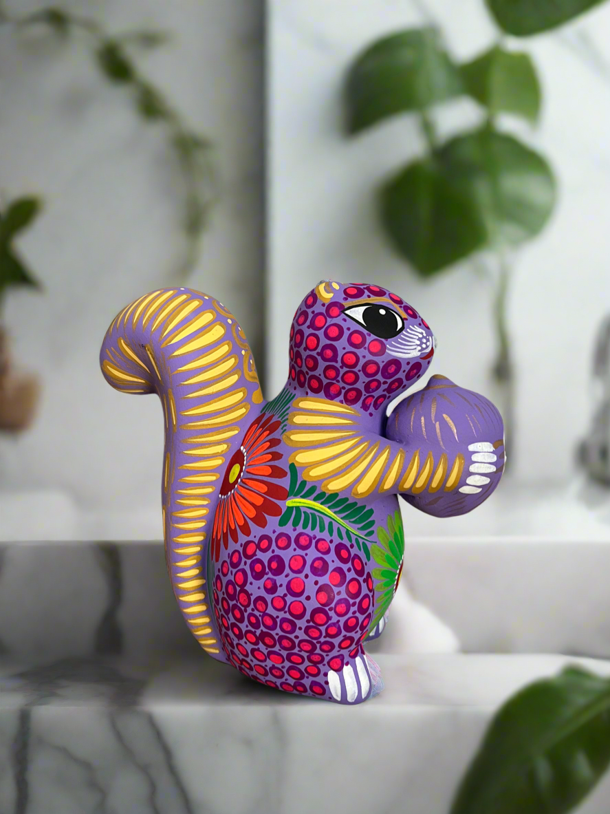 Lavender Squirrel Holding a Nut Figurine