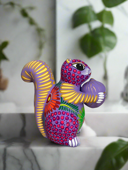 Lavender Squirrel Holding a Nut Figurine